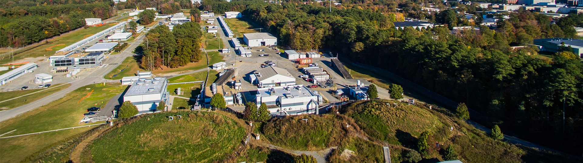 Aerial photo of the Continuous Electron Beam Accelerator Facility with the experimental halls.